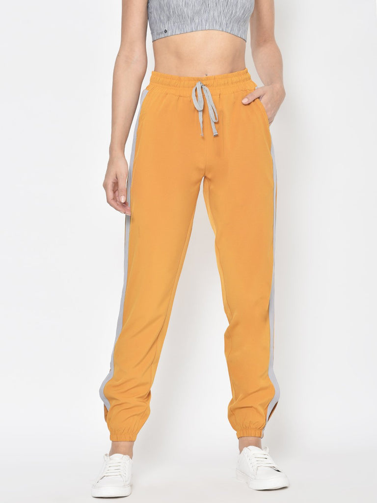 Buy Zastraa Women Mustard Yellow Slim Fit Solid Peg Trousers - Trousers for  Women 9476139 | Myntra