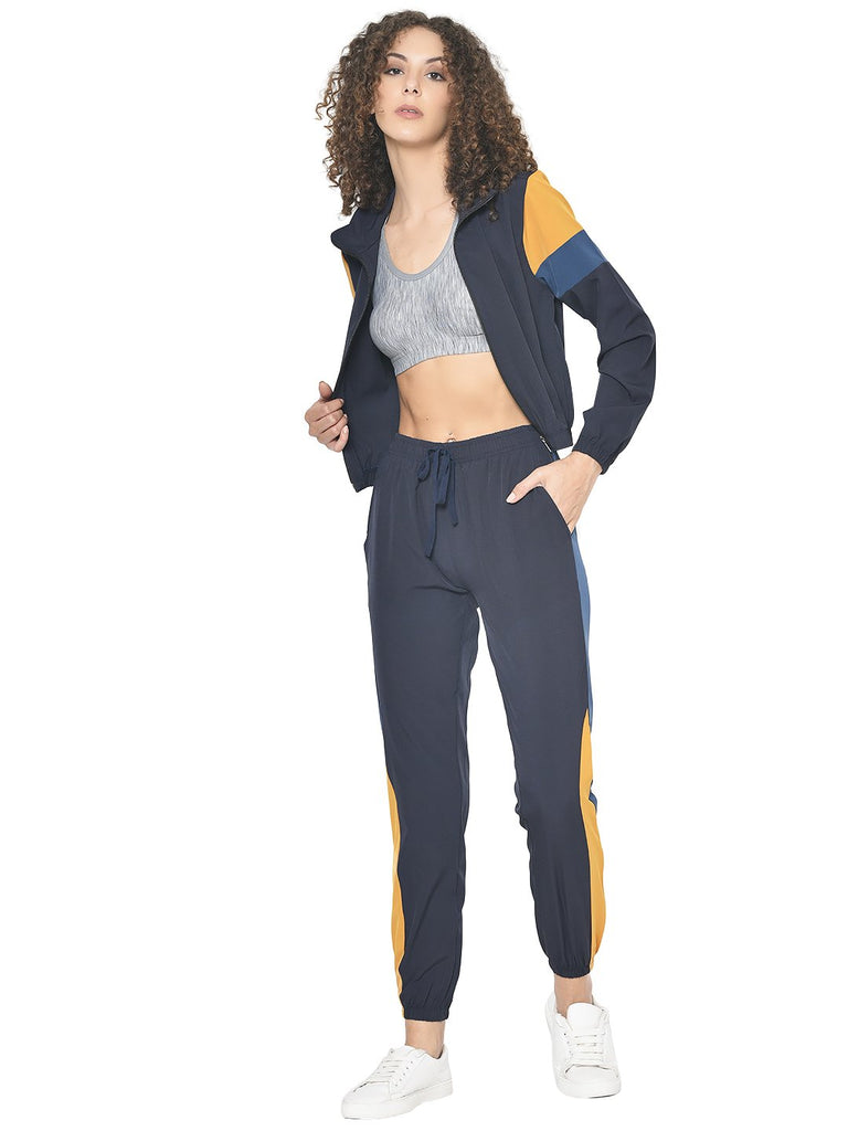 https://www.cliths.com/cdn/shop/products/tracksuit-americanelm-women-s-navy-blue-stretchable-stylish-tracksuits-27973498798146_1024x1024.jpg?v=1632603122